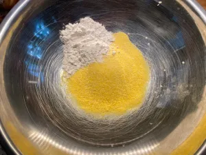 Flour and cornmeal in a bowl