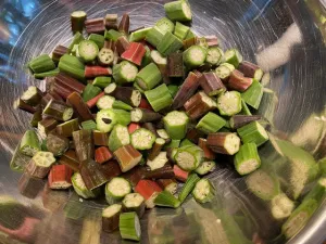 Okra pieces in pan