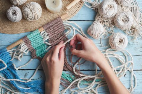 hands weaving macrame