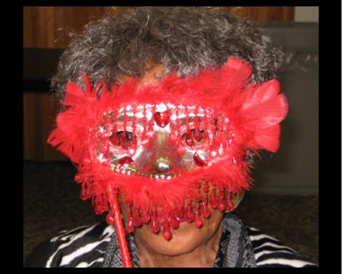 Woman in a red mask