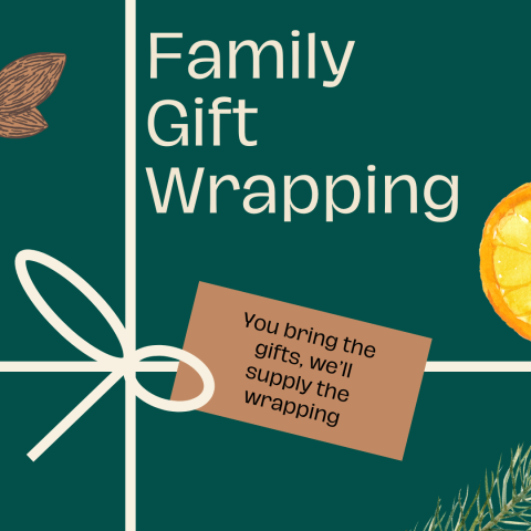 green square with white bow, orange slice, pine needles, and almonds with the words "Family Gift Wrapping: you bring the gifts, we'll supply the wrapping."