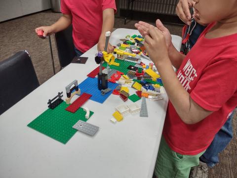 Children building with Legos.