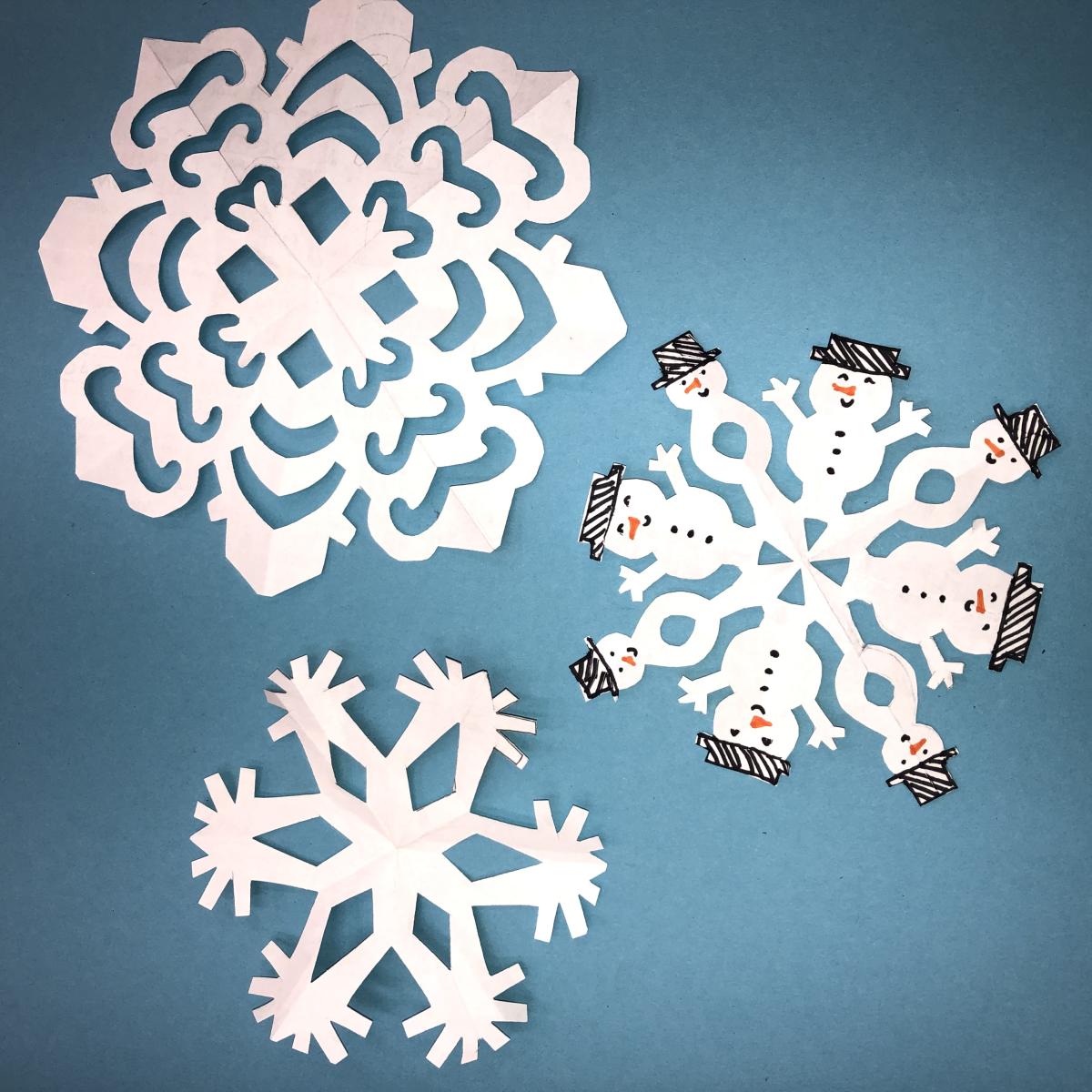 Image of cut paper snowflakes