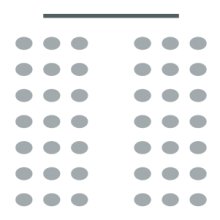 Room set up with screen at front and two columns of chairs with a central aisle